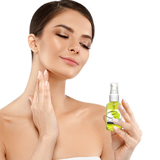 Woman applying Sylkyn Moisture Serum